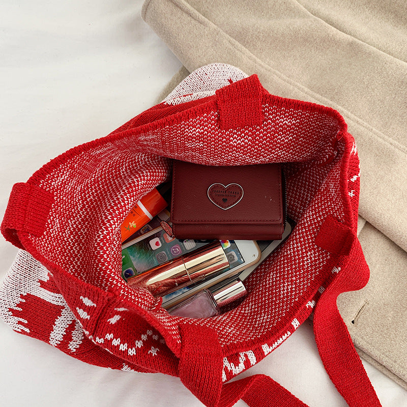 Hand-held knitted wool handbags